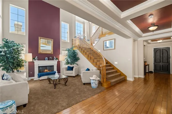 a view of entryway livingroom and hall