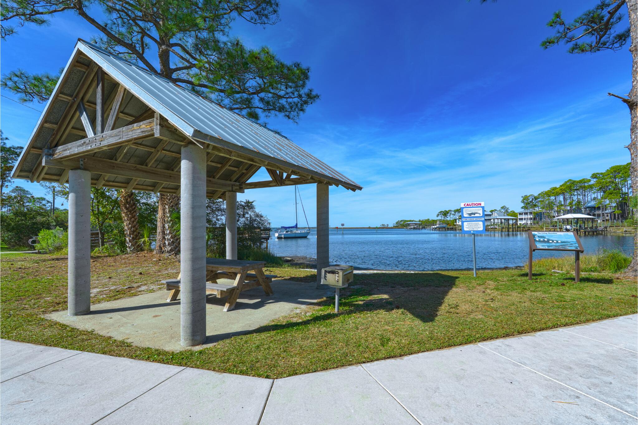 367 East Nursery Road Santa Rosa Beach, FL 32459 - Photo 15 of 19 a view of a house with backyard and porch