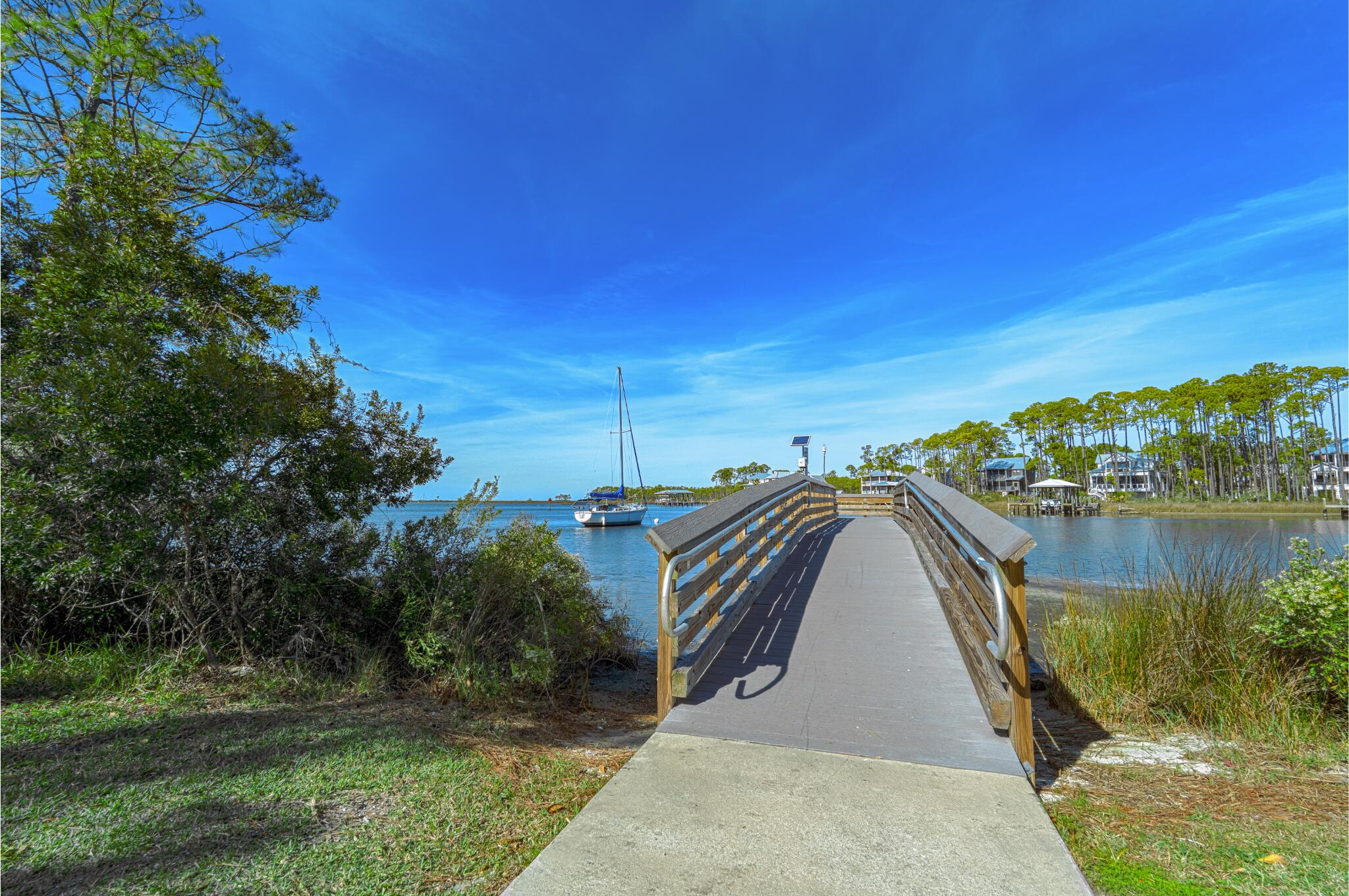 367 East Nursery Road Santa Rosa Beach, FL 32459 - Photo 17 of 19 a view of a lake with a yard