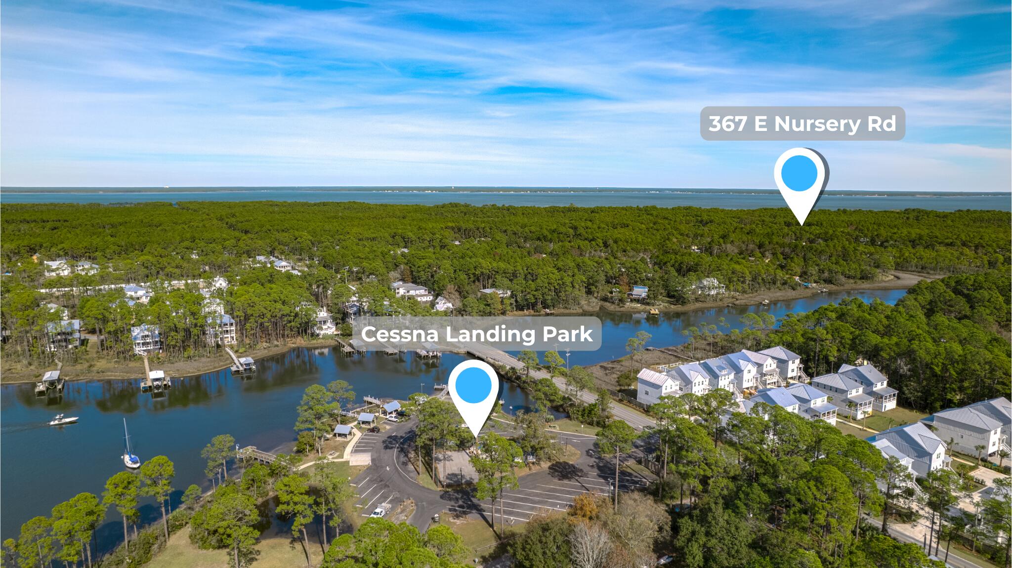 367 East Nursery Road Santa Rosa Beach, FL 32459 - Photo 8 of 19 a view of a lake with a city view