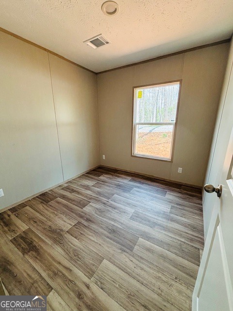 169 Lakeside Trail Martin, GA 30557 - Photo 16 of 19 a view of a room with wooden floor and window
