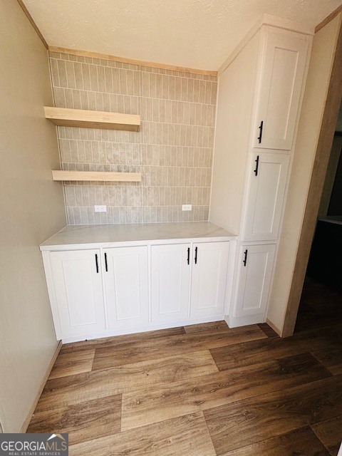 169 Lakeside Trail Martin, GA 30557 - Photo 7 of 19 a view of a room with wooden floor and cabinet
