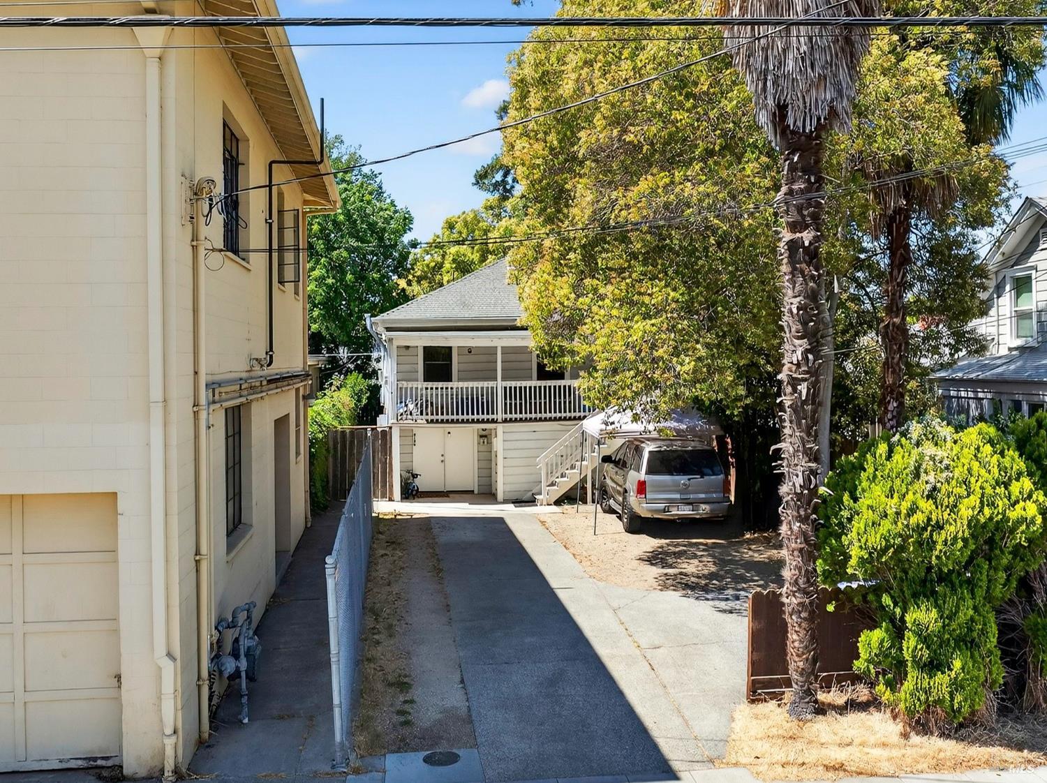 918 Napa Street Napa, CA 94559 - Photo 2 of 18 a view of a patio with table and chairs with wooden floor and plants