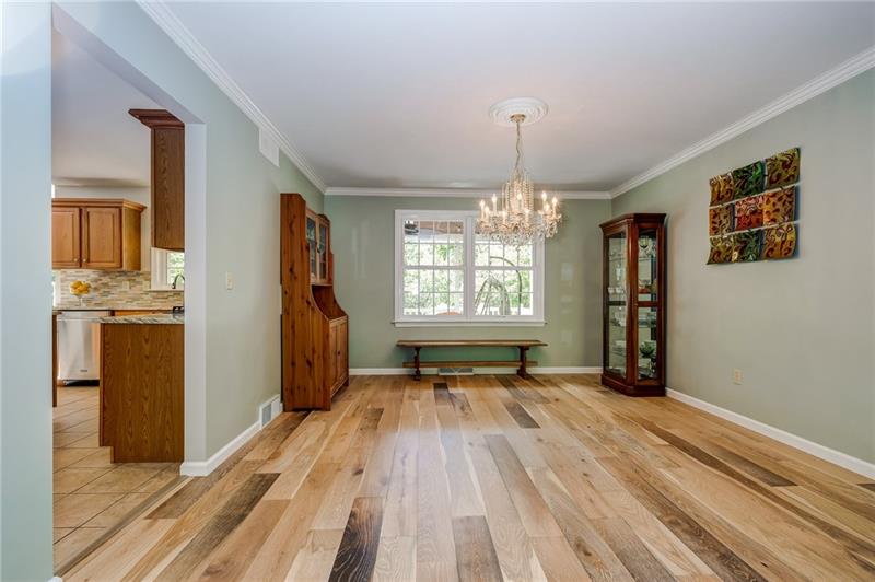 130 West Cruikshank Road Butler, PA 16002 - Photo 11 of 25 Engineered hardwood plank flooring recently installed in Living, Dining and Office space.