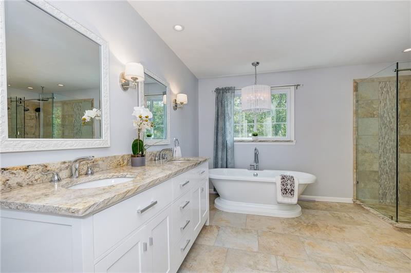 130 West Cruikshank Road Butler, PA 16002 - Photo 16 of 25 Show stopper! Luxurious Master bath with gorgeous granite, & Pedestal tub.