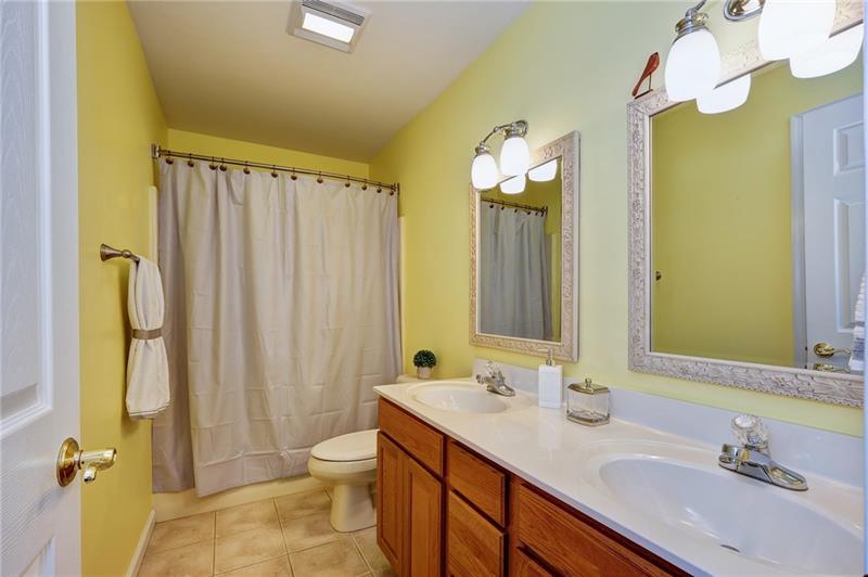 130 West Cruikshank Road Butler, PA 16002 - Photo 20 of 25 Second floor full bath features updated lighting and double bowl sink.