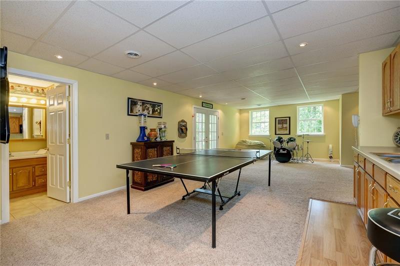 130 West Cruikshank Road Butler, PA 16002 - Photo 21 of 25 Get ready for fun! Gameroom with plenty of light and space. There is a full bath on this level also.