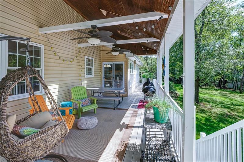130 West Cruikshank Road Butler, PA 16002 - Photo 24 of 25 What a place to relax and enjoy nature! covered porch with skylight detail and paddle fans. This space is accessed from your main level family room.