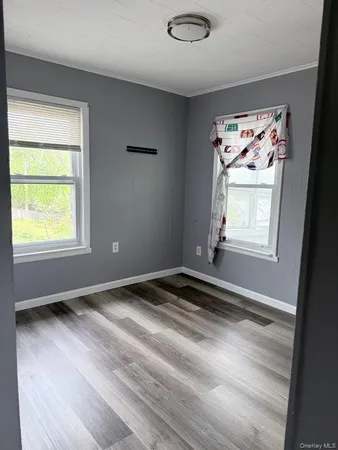 a view of an empty room and window