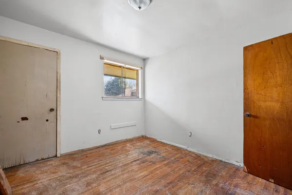 an empty room with windows