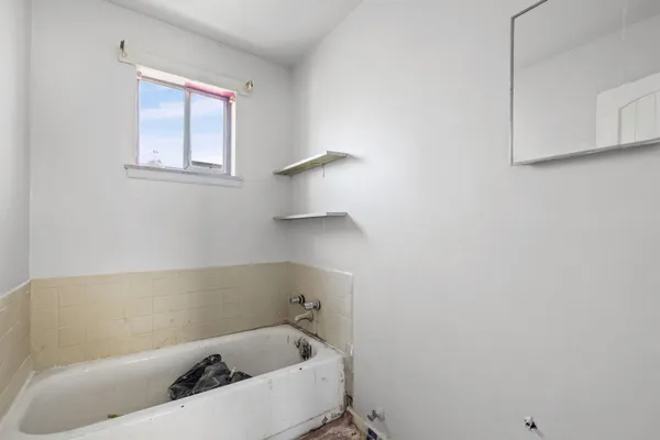 an empty room with window