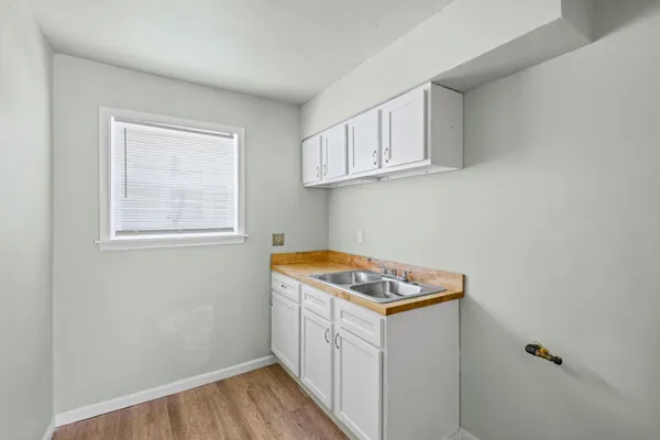 a utility room with washer and dryer