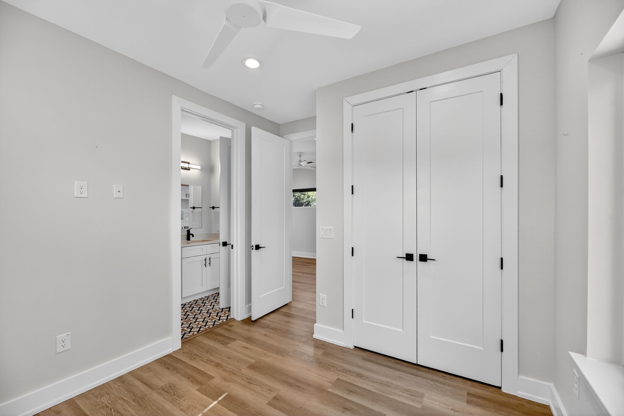 6107 Palm Circle Austin, TX 78741 - Photo 15 of 30 wooden floor with white walls