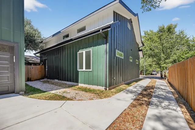 a front view of a house having yard