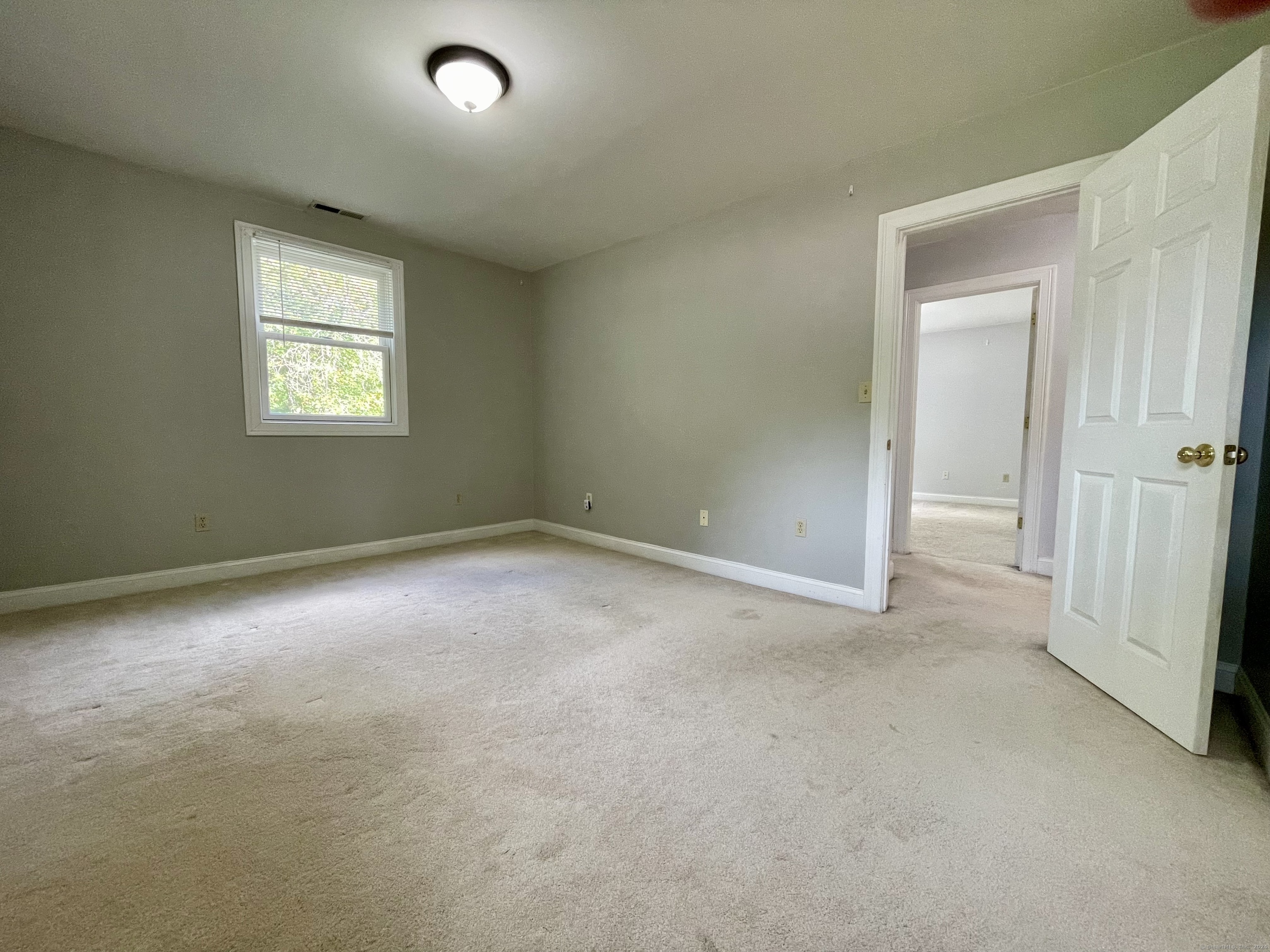 70 Grimes Road Rocky Hill, CT 06067 - Photo 13 of 23 an empty room with a window