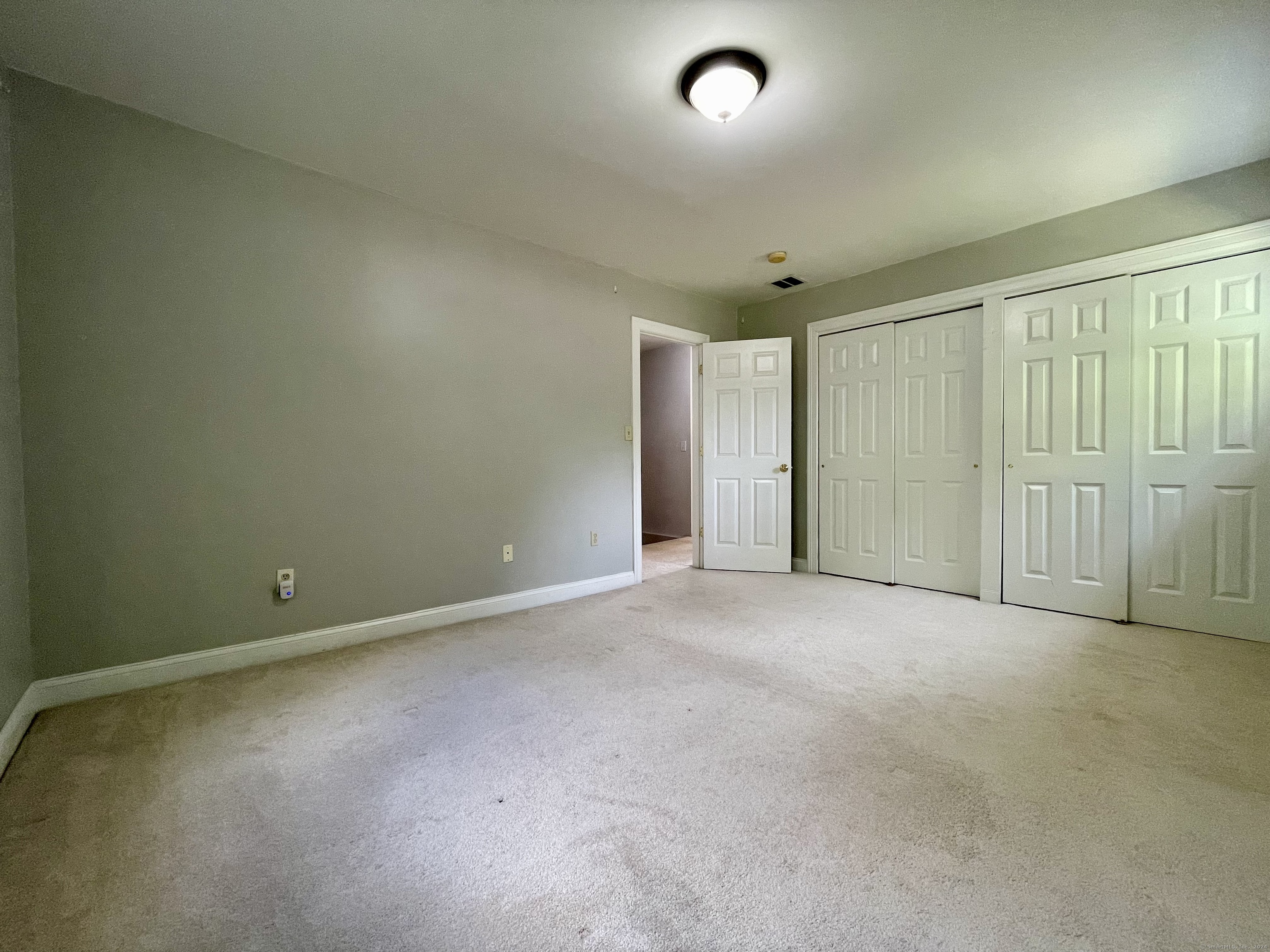 70 Grimes Road Rocky Hill, CT 06067 - Photo 14 of 23 an empty room with windows