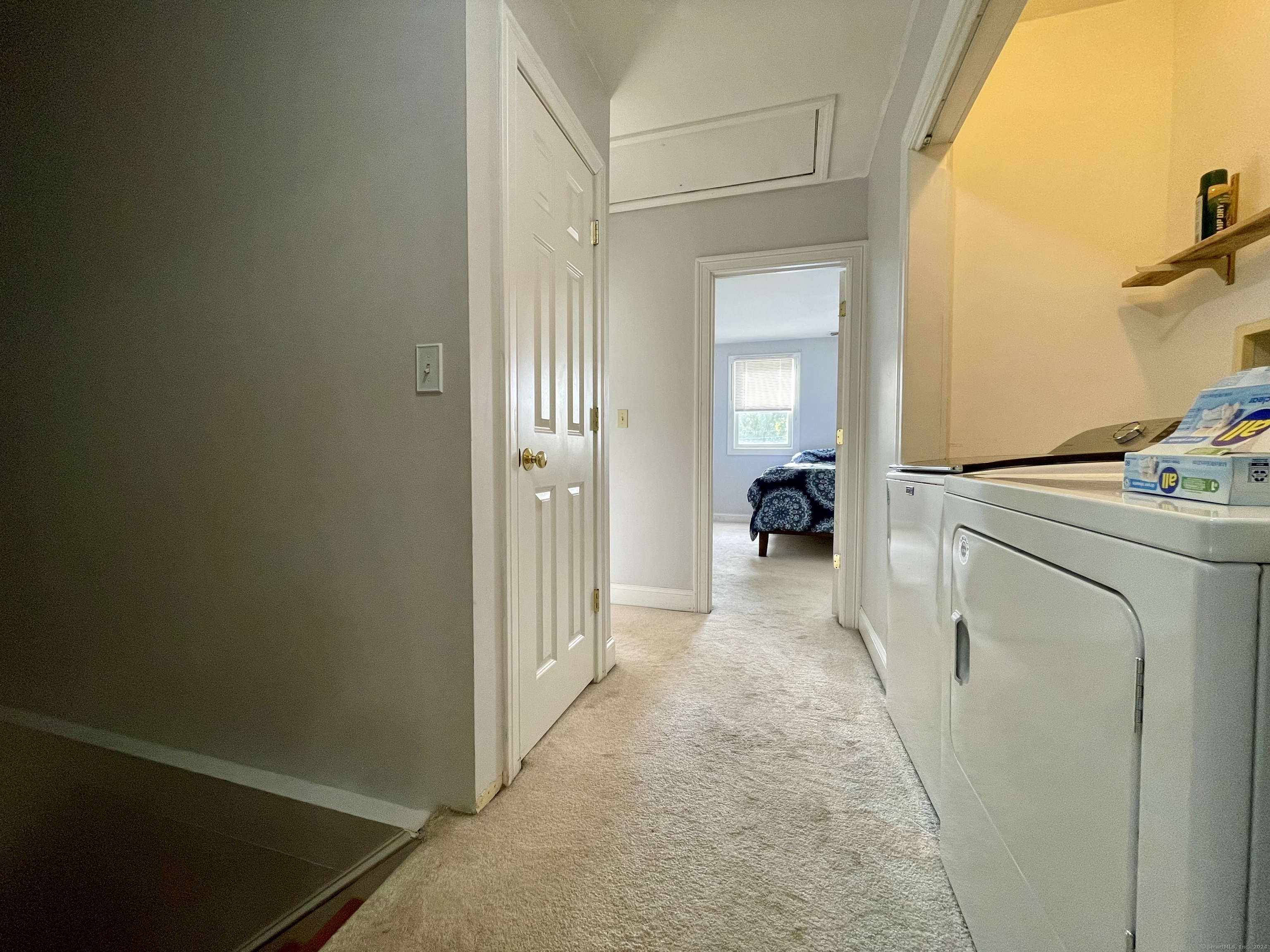 70 Grimes Road Rocky Hill, CT 06067 - Photo 23 of 23 a view of hallway with washer and dryer