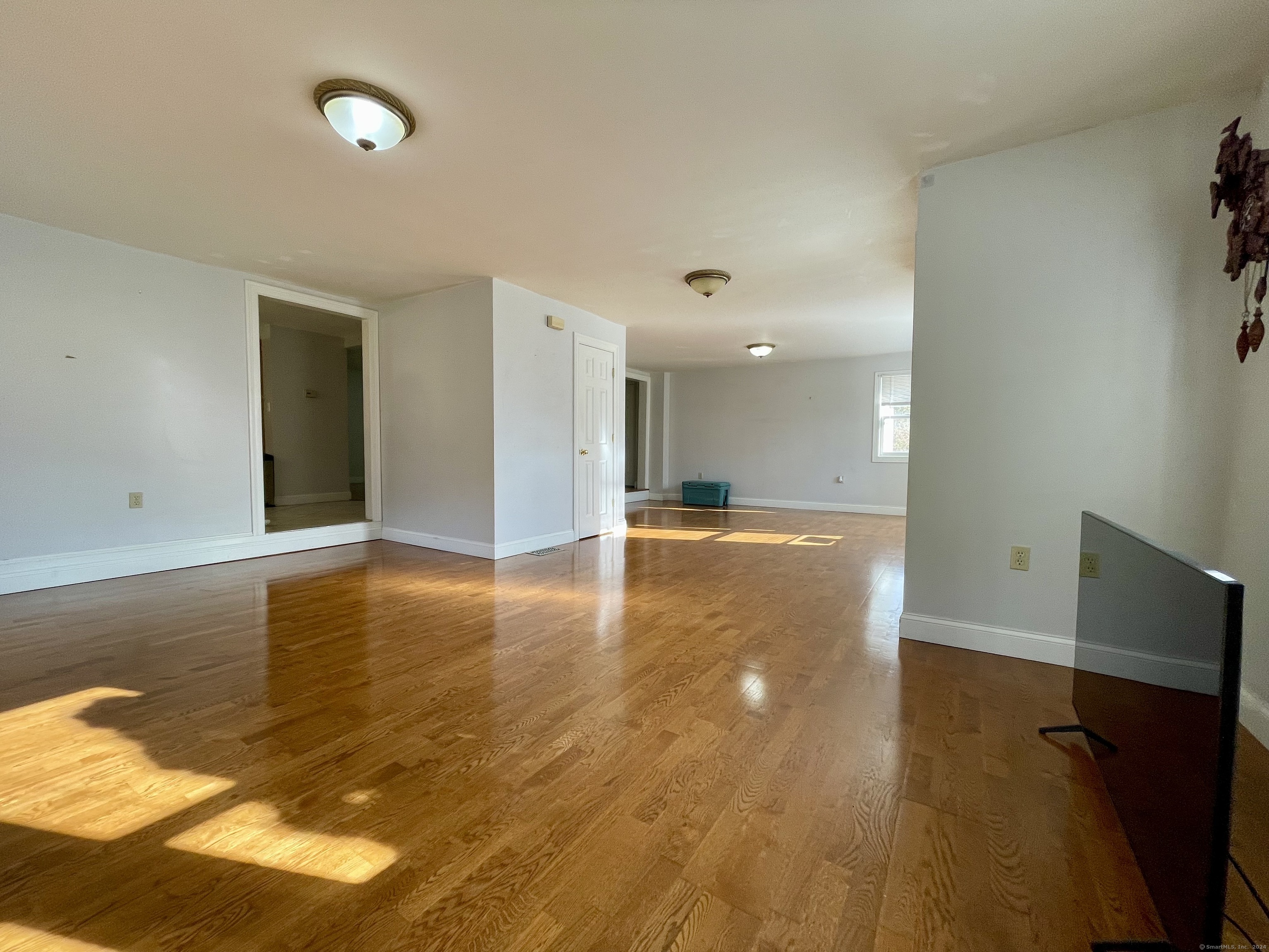 70 Grimes Road Rocky Hill, CT 06067 - Photo 6 of 23 a view of a livingroom with wooden floor