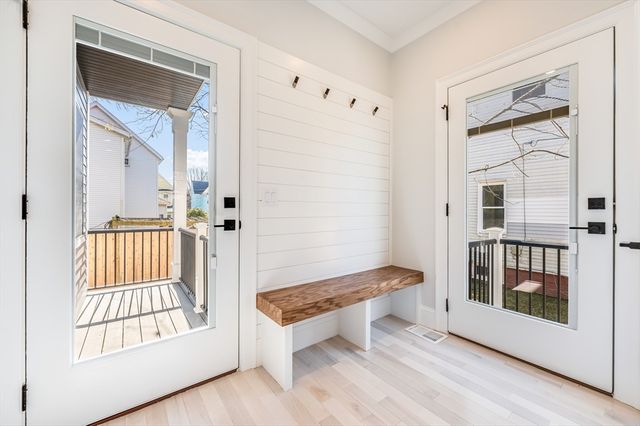 a spacious bedroom with a bed and a window