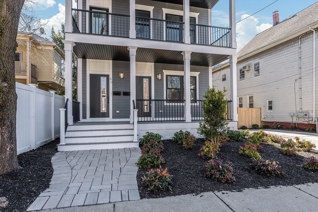 a view of a house with a garden