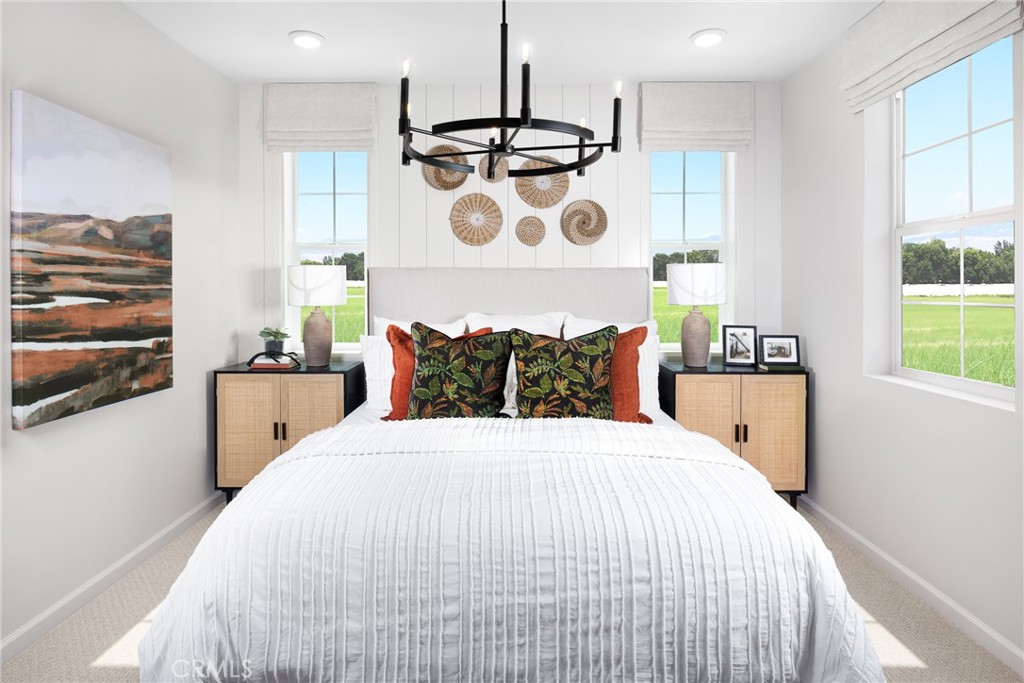 4083 Summer Way Corona, CA 92883 - Photo 15 of 18 a bedroom with a bed and furniture