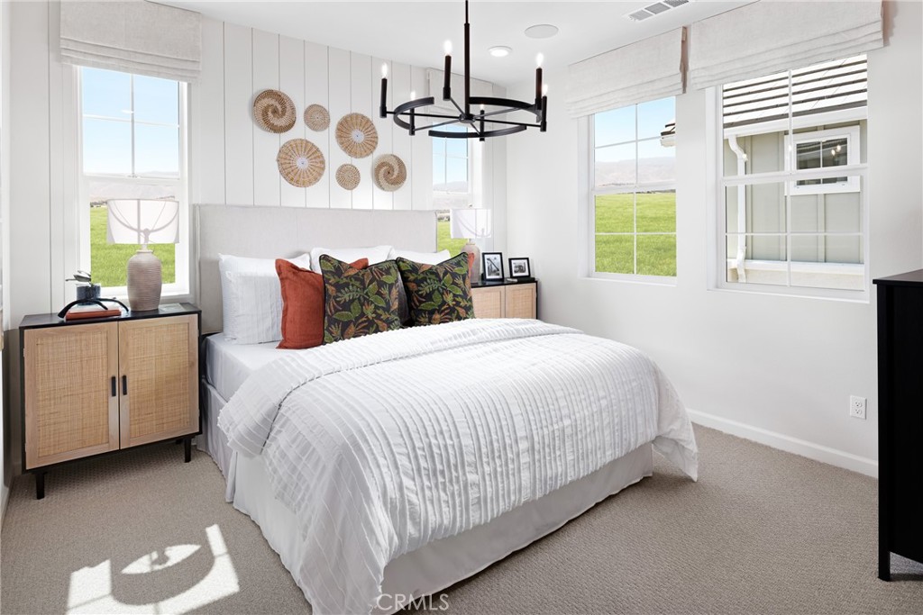 4083 Summer Way Corona, CA 92883 - Photo 16 of 18 a bedroom with a bed and a window