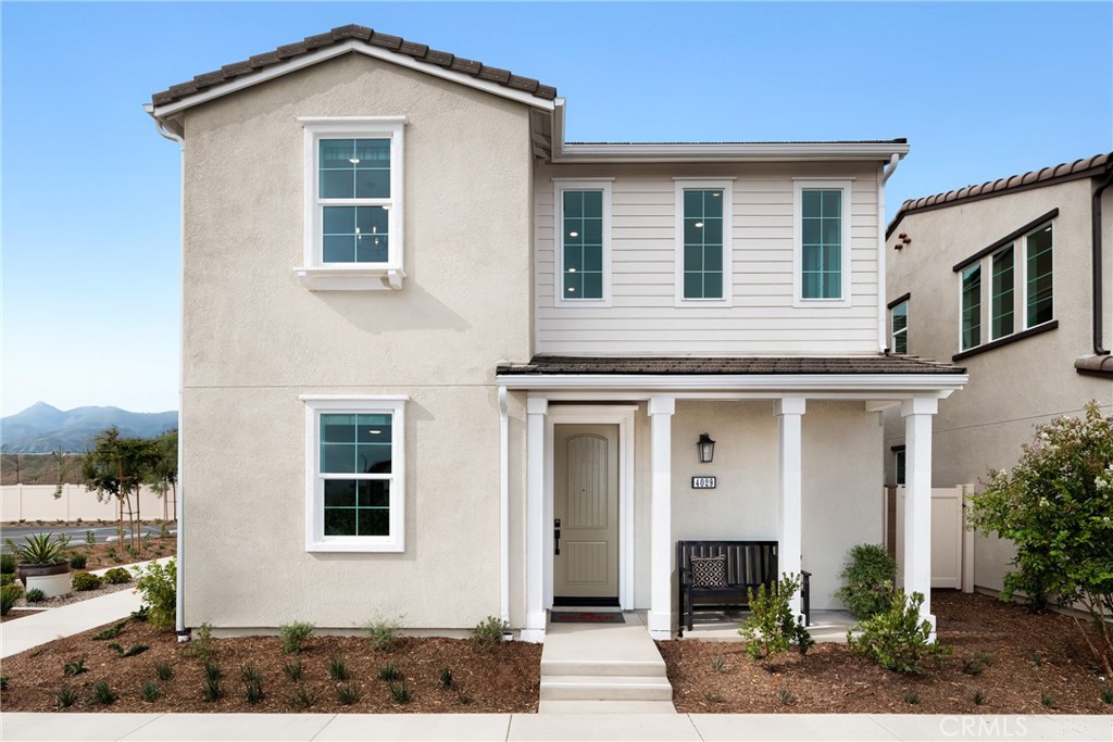 4083 Summer Way Corona, CA 92883 - Photo 2 of 18 a front view of a house with garden