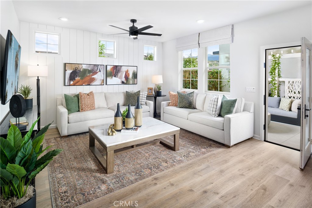 4083 Summer Way Corona, CA 92883 - Photo 7 of 18 a living room with furniture and a large window