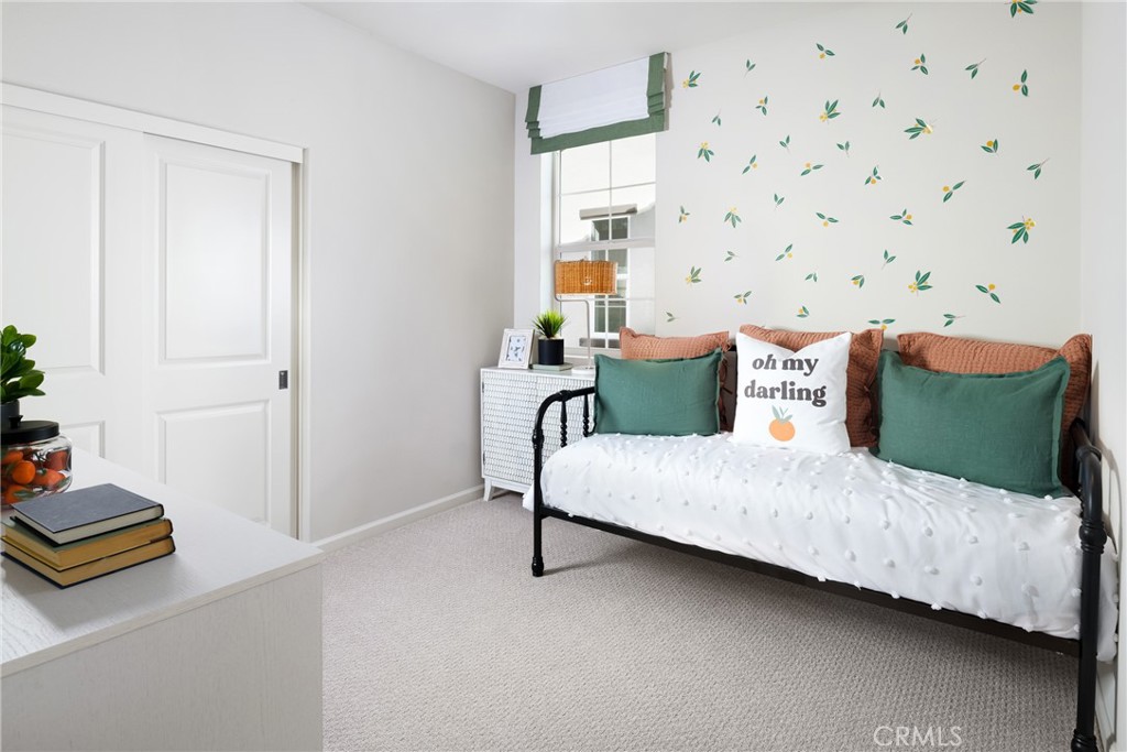 4083 Summer Way Corona, CA 92883 - Photo 9 of 18 a bedroom with a bed and a potted plant