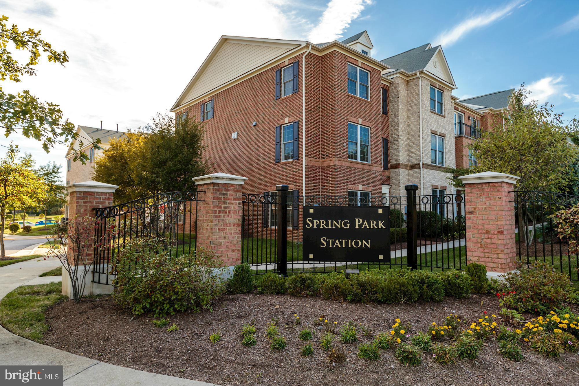 397 Spring Street Herndon, VA 20170 - Photo 2 of 30 a front view of a house with garden