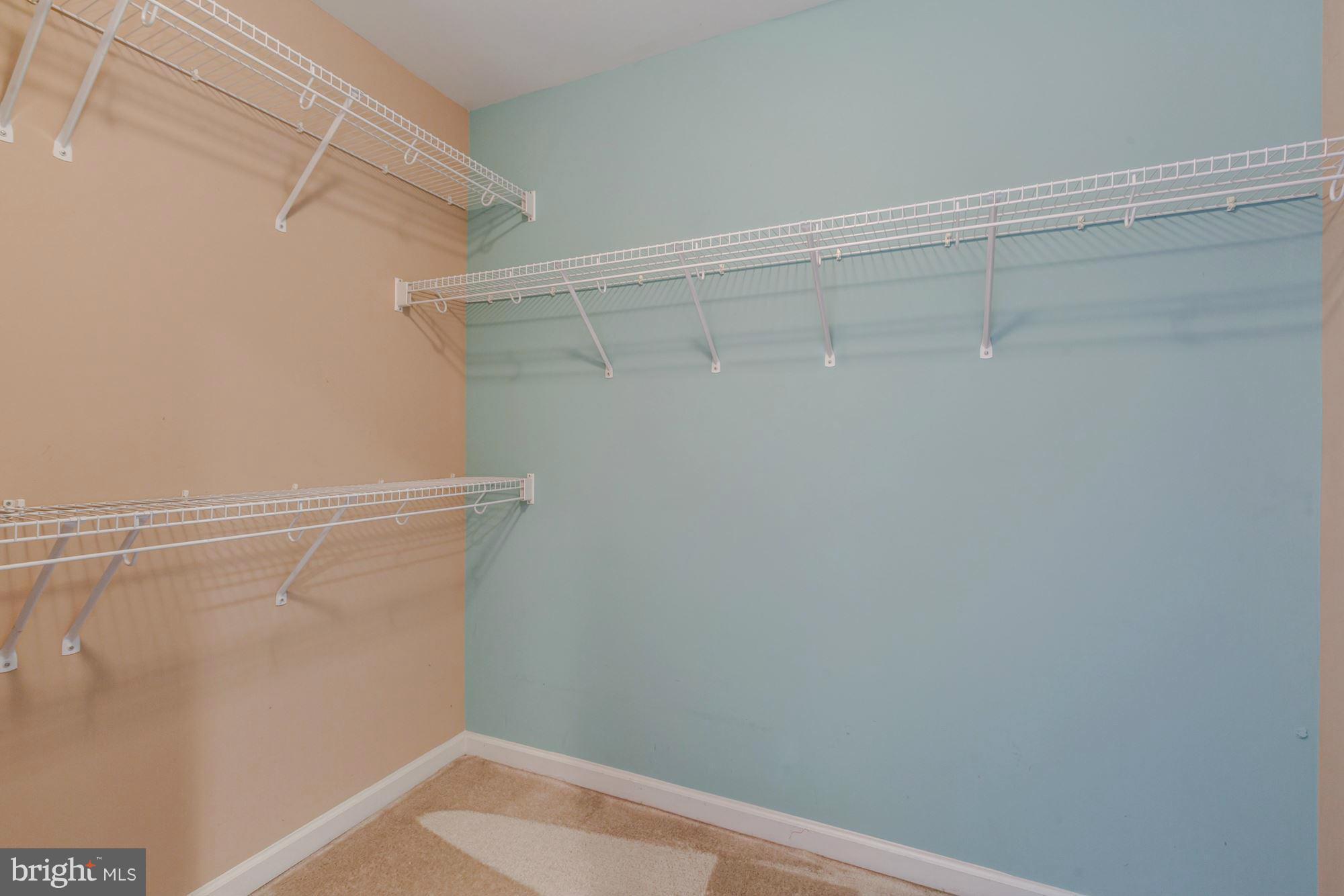 397 Spring Street Herndon, VA 20170 - Photo 19 of 30 a view of a room with racks on the wall