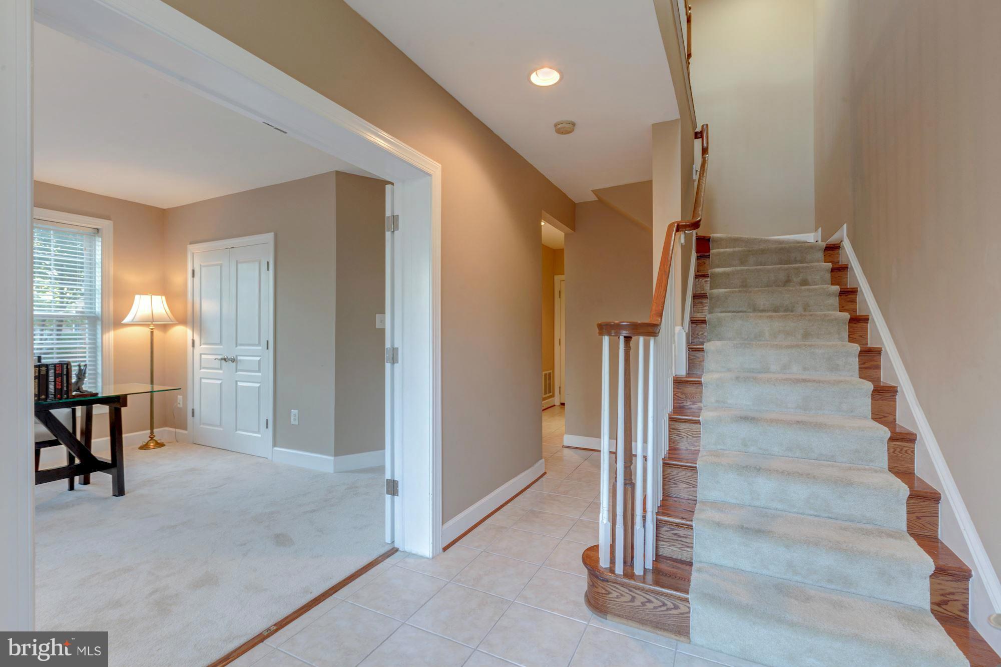 397 Spring Street Herndon, VA 20170 - Photo 3 of 30 a view of a hallway with elevator