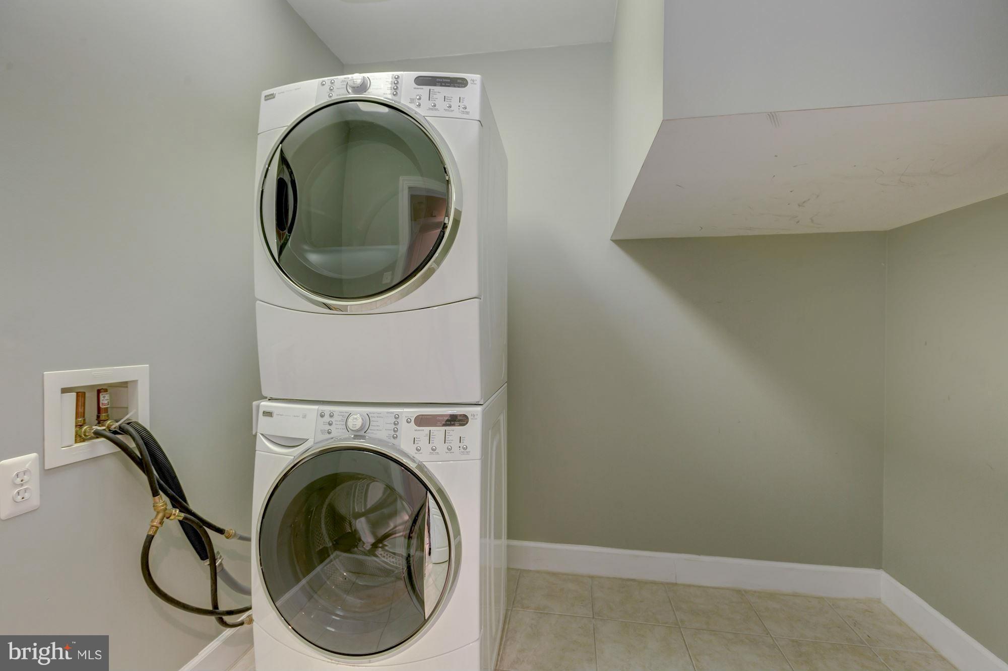 397 Spring Street Herndon, VA 20170 - Photo 25 of 30 a utility room with dryer and washer