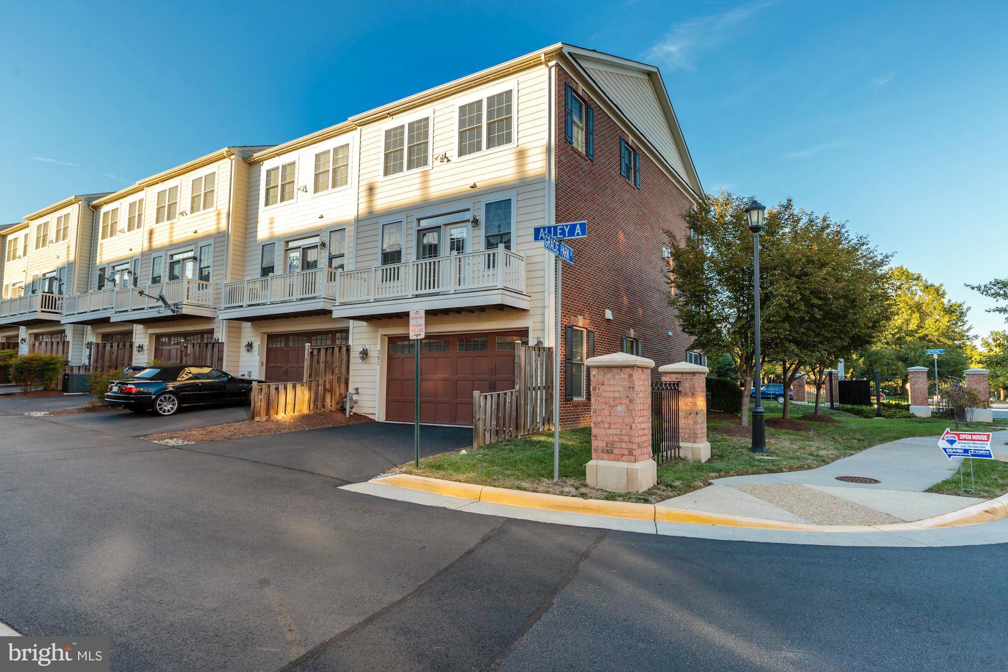 397 Spring Street Herndon, VA 20170 - Photo 27 of 30 a front view of a building with cars parked