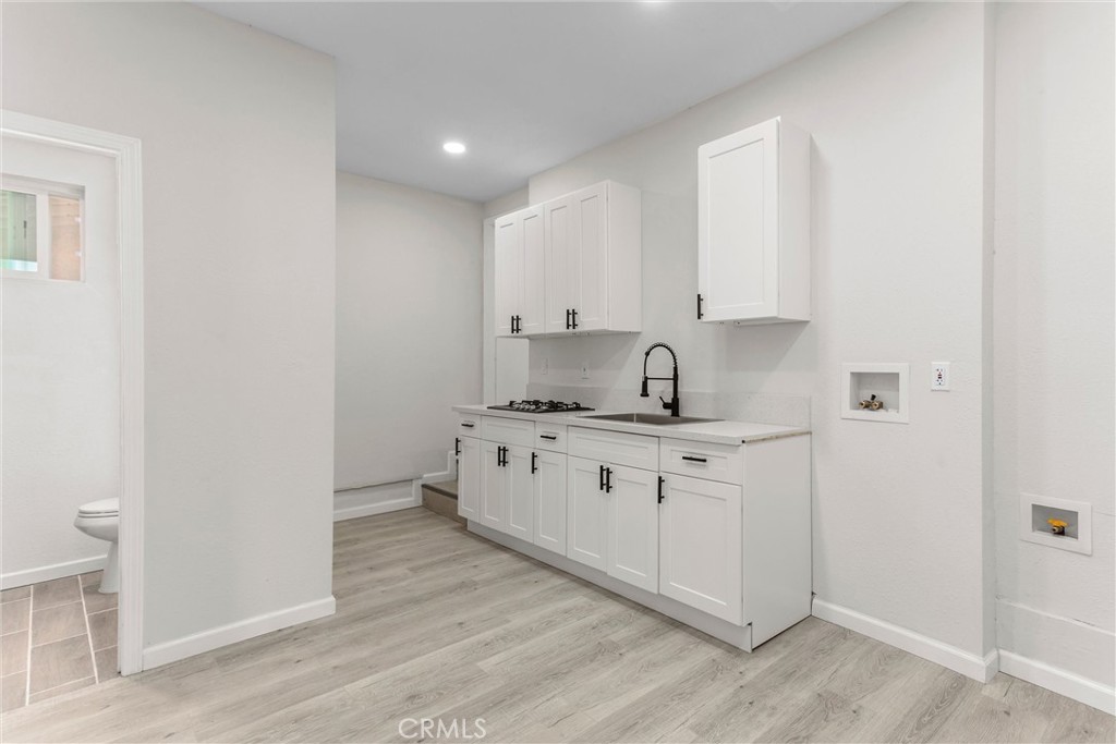 247 Grant Street Rialto, CA 92376 - Photo 28 of 40 ADU Kitchenette and shared laundry hookups