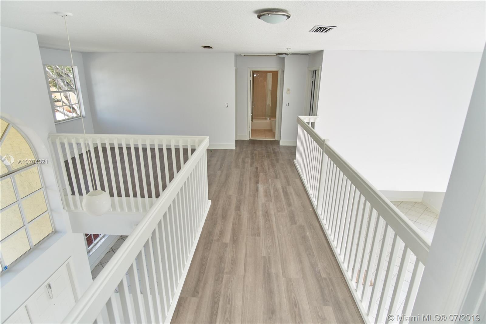 10646 Wheelhouse Circle Boca Raton, FL 33428 - Photo 19 of 34 2ND FLOOR HALLWAY