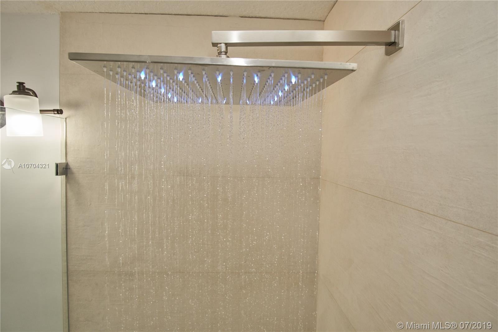 10646 Wheelhouse Circle Boca Raton, FL 33428 - Photo 28 of 34 MASTER BATHROOM LED SHOWERHEAD