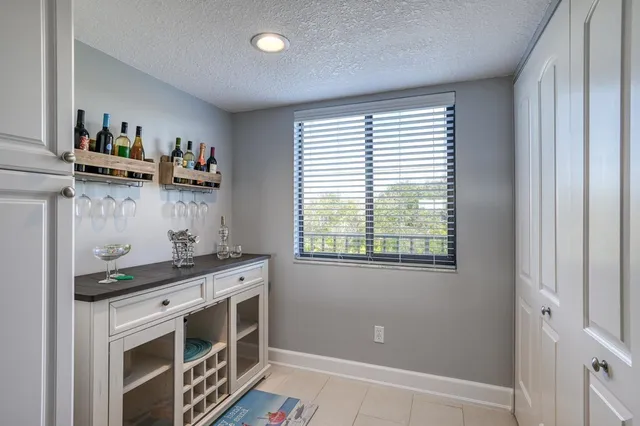 a kitchen with stainless steel appliances a stove and a refrigerator