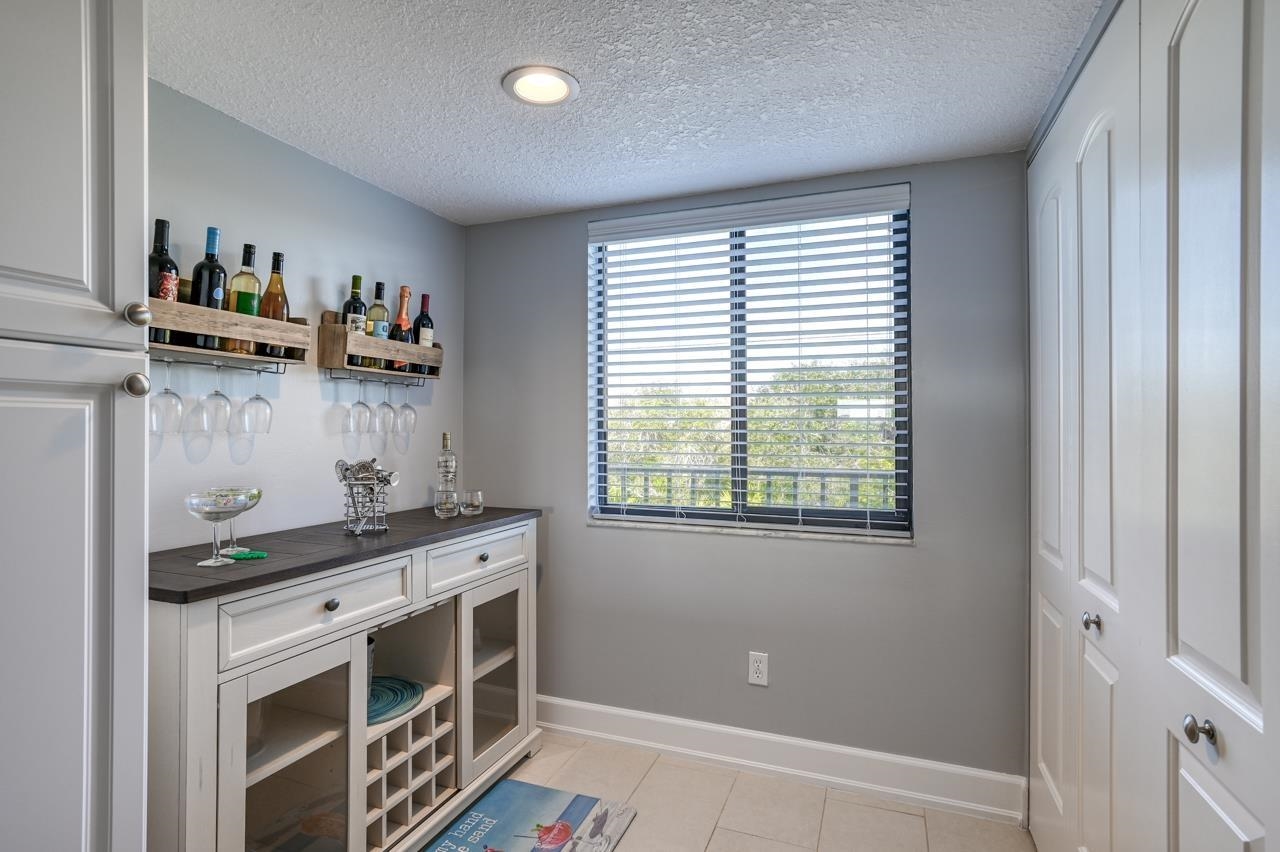120 Sunset Harbor Way, Unit 204 St. Augustine, FL 32080 - Photo 14 of 49 a kitchen with stainless steel appliances a stove and a refrigerator