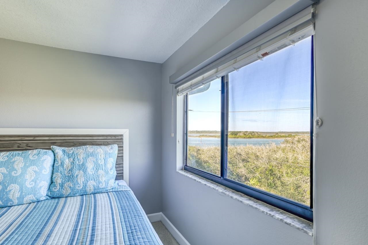 120 Sunset Harbor Way, Unit 204 St. Augustine, FL 32080 - Photo 39 of 49 a view of a room with wooden floor and a window