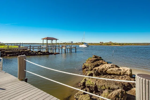 an aerial view of a house with outdoor space