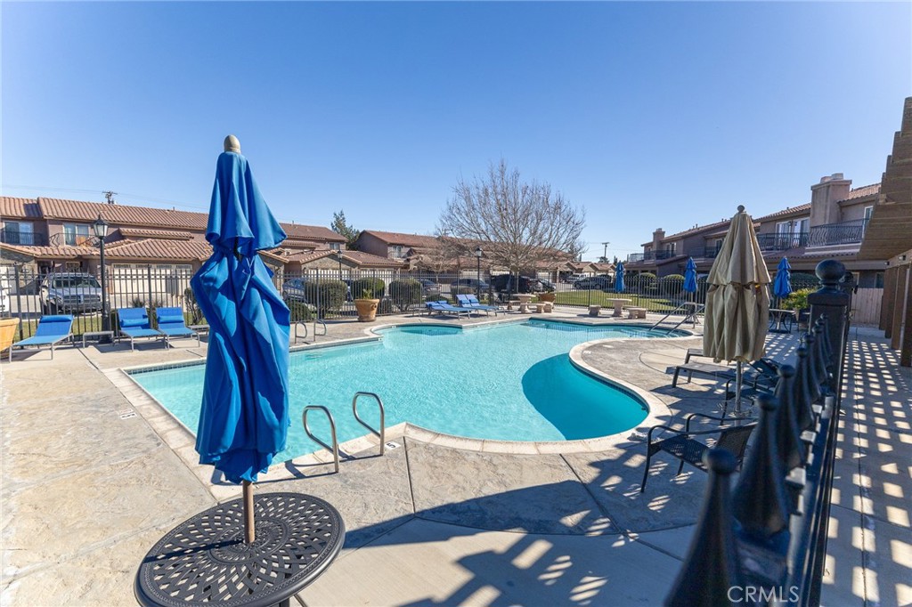 14176 Kiowa Road Apple Valley, CA 92307 - Photo 48 of 54 a view of outdoor space patio and swimming pool