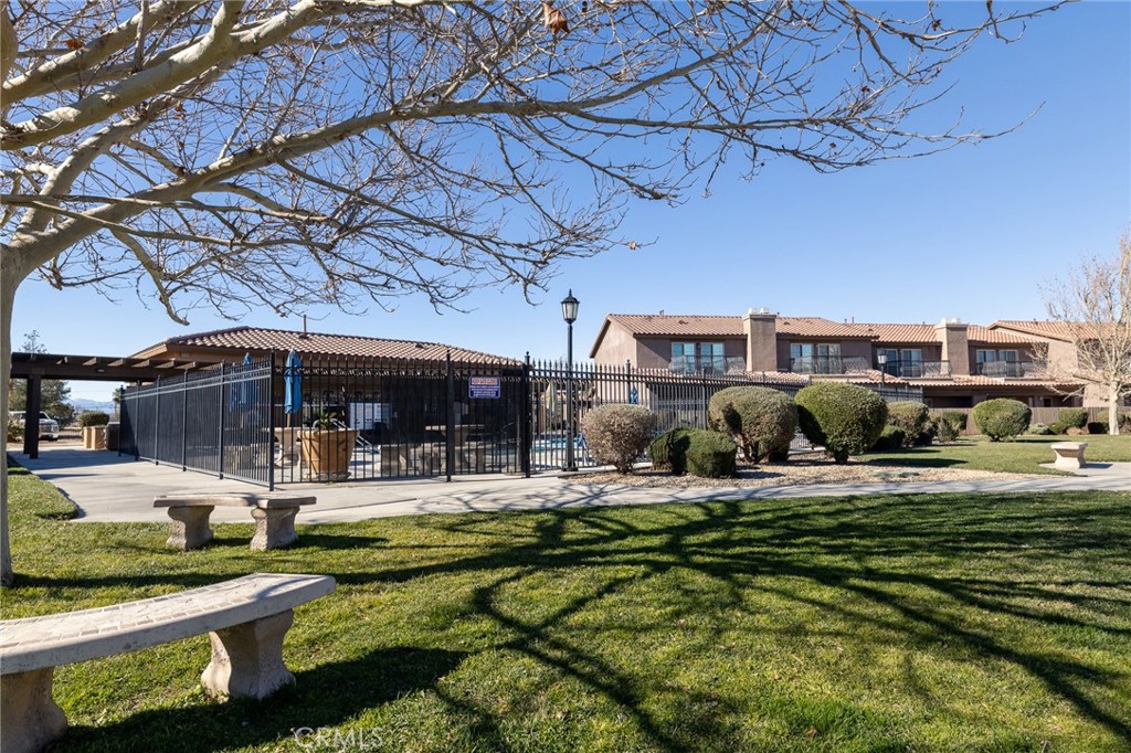 14176 Kiowa Road Apple Valley, CA 92307 - Photo 50 of 54 a swimming pool with outdoor seating and yard