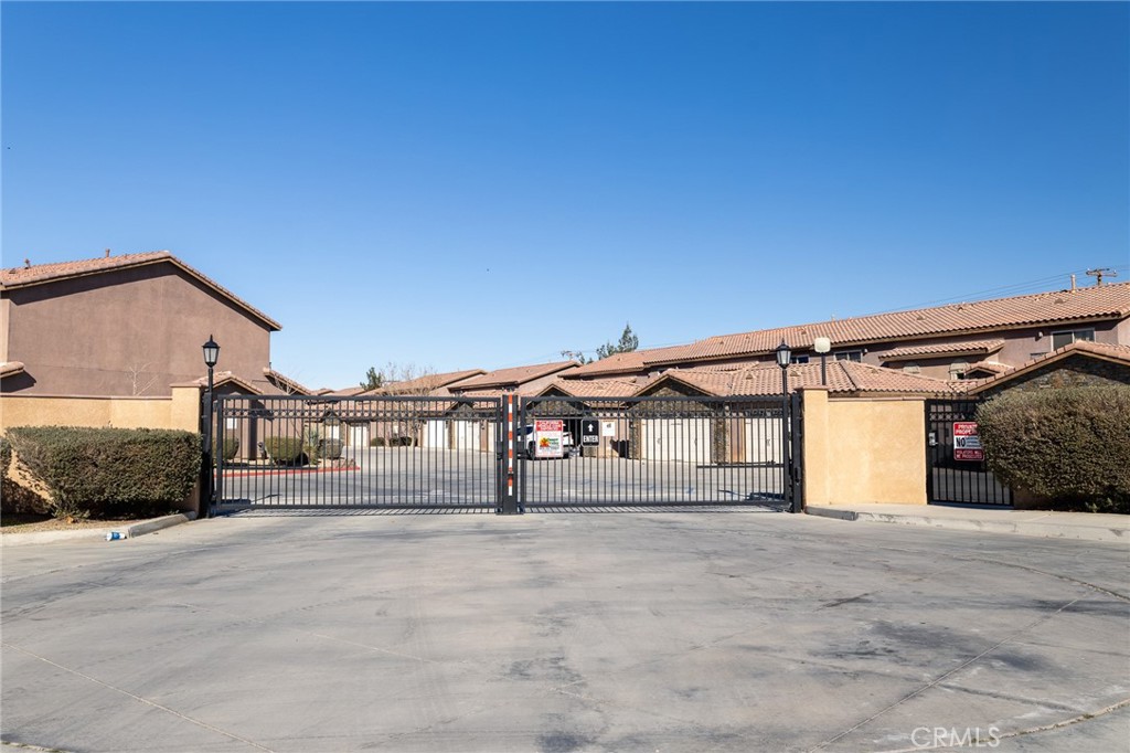 14176 Kiowa Road Apple Valley, CA 92307 - Photo 6 of 54 a view of a house with a outdoor space