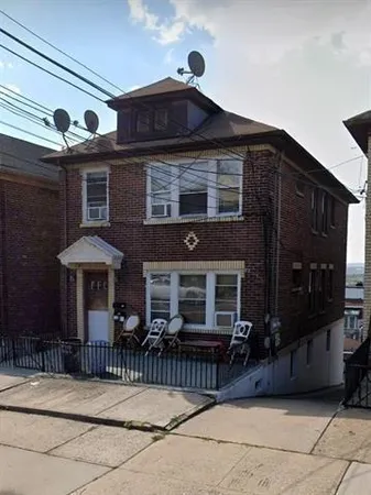 a front view of a house with a porch