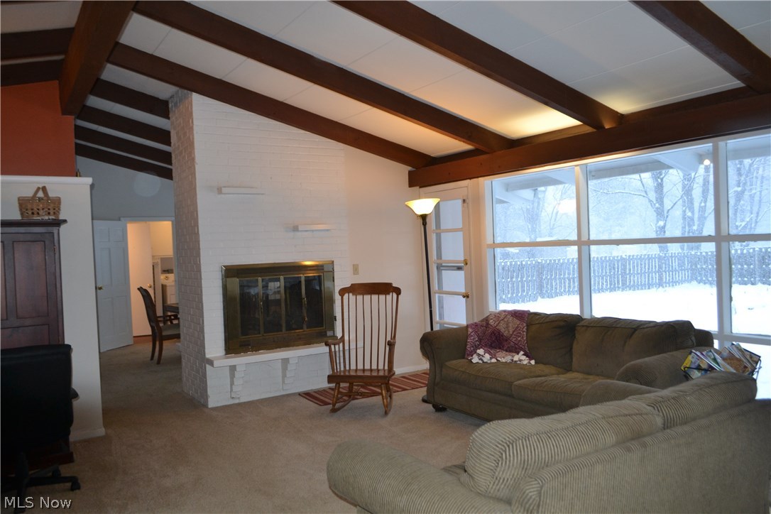 35380 Solon Road Solon, OH 44139 - Photo 6 of 18 Family room with two-sided fireplace.