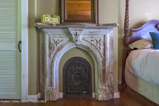 a bathroom with a toilet and a mirror