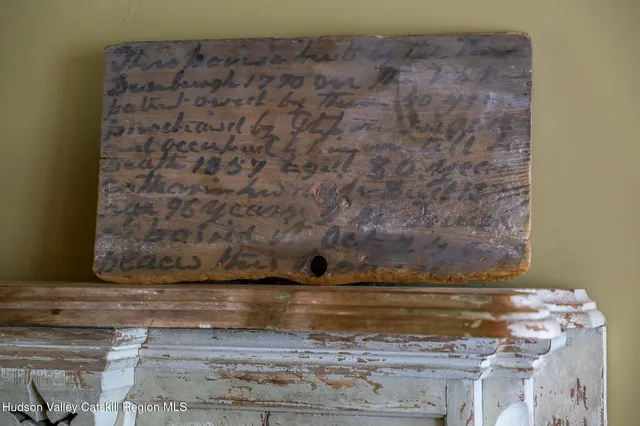 a view of a grassy field with trees