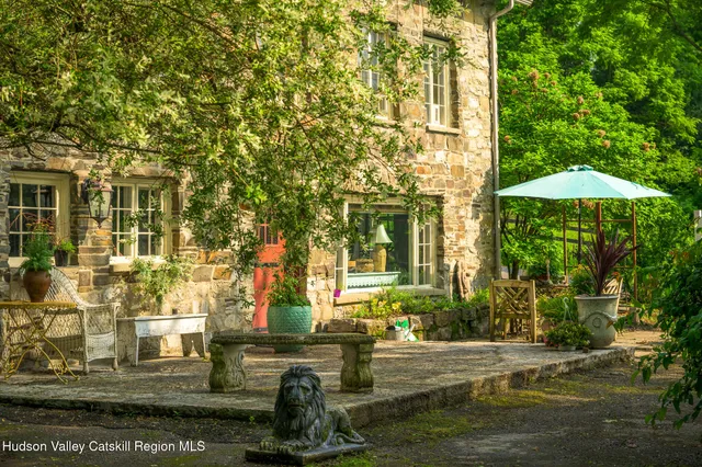 a house view with a garden space
