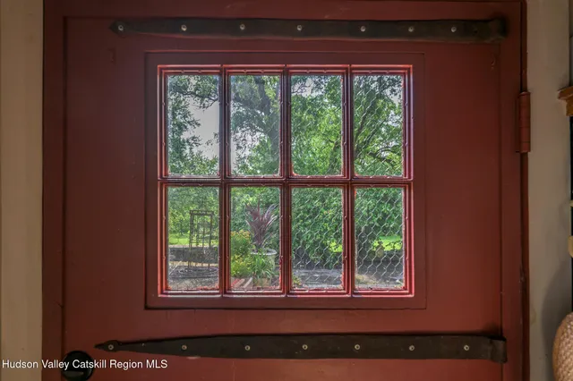 a view of a room that has a window